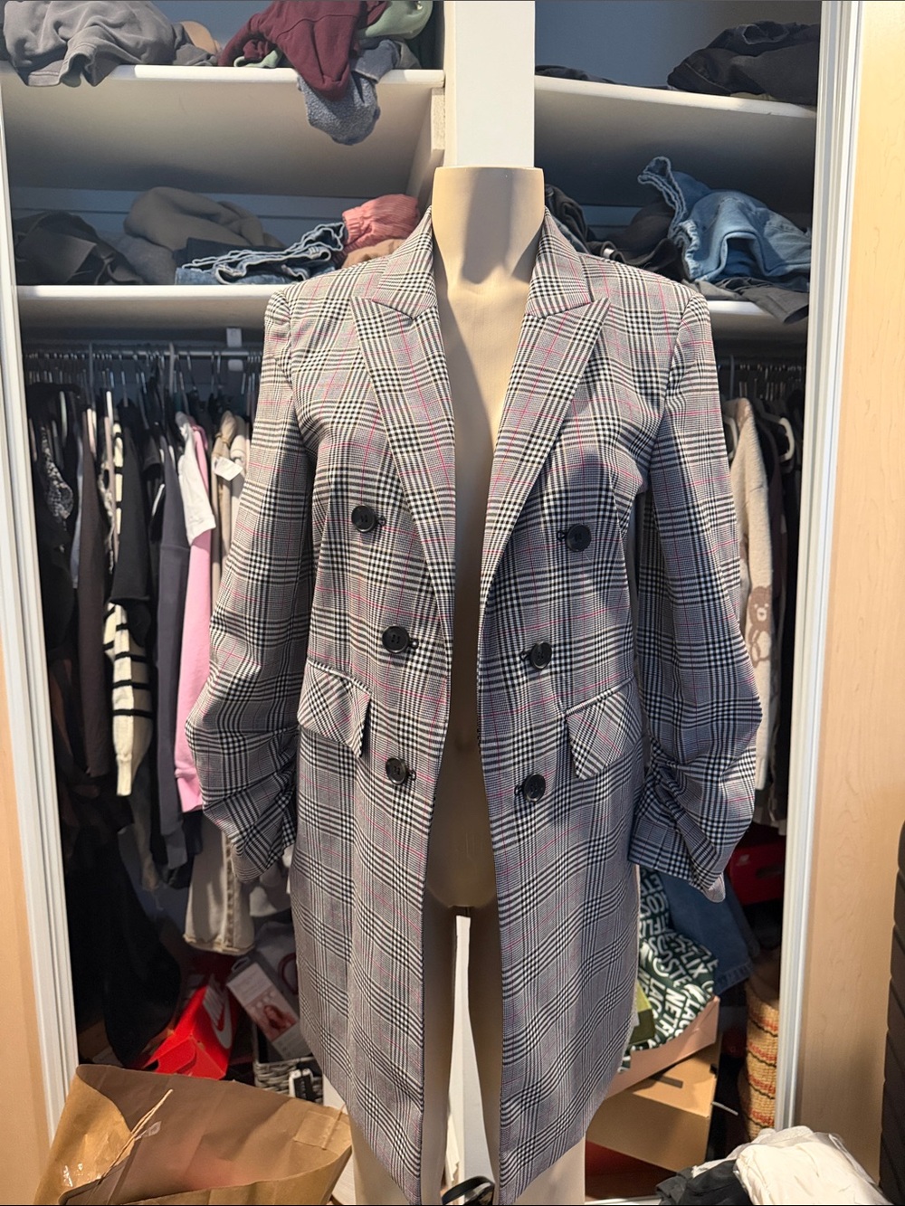 1. State Black Jacket with Black-and-White Plaid Lining and Pink Accents